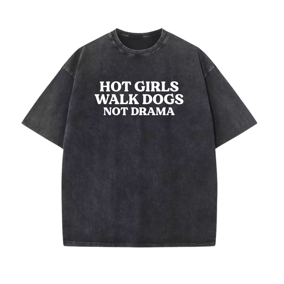 Black washed oversized cotton t‑shirt with drop‑shoulder fit and bold white text “HOT GIRLS WALK DOGS NOT DRAMA” — trendy women’s dog lover tee.