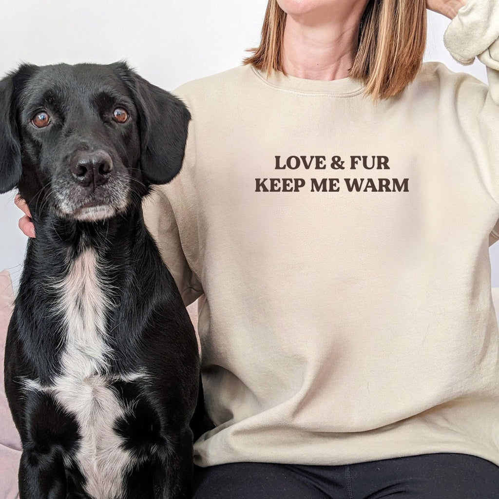 Unisex sweatshirt with text “LOVE & FUR KEEP ME WARM” — cozy crewneck pullover for dog and cat lovers.