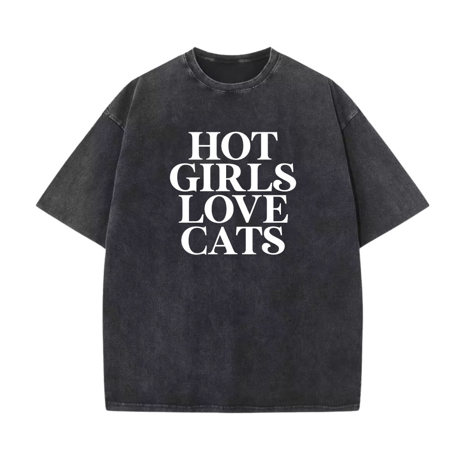 Washed cotton oversized t‑shirt with drop shoulder design and bold white graphic text “HOT GIRLS LOVE CATS” — trendy women’s cat lover tee.