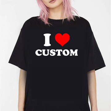Person wearing a black t-shirt with 'I ❤️ CUSTOM' text