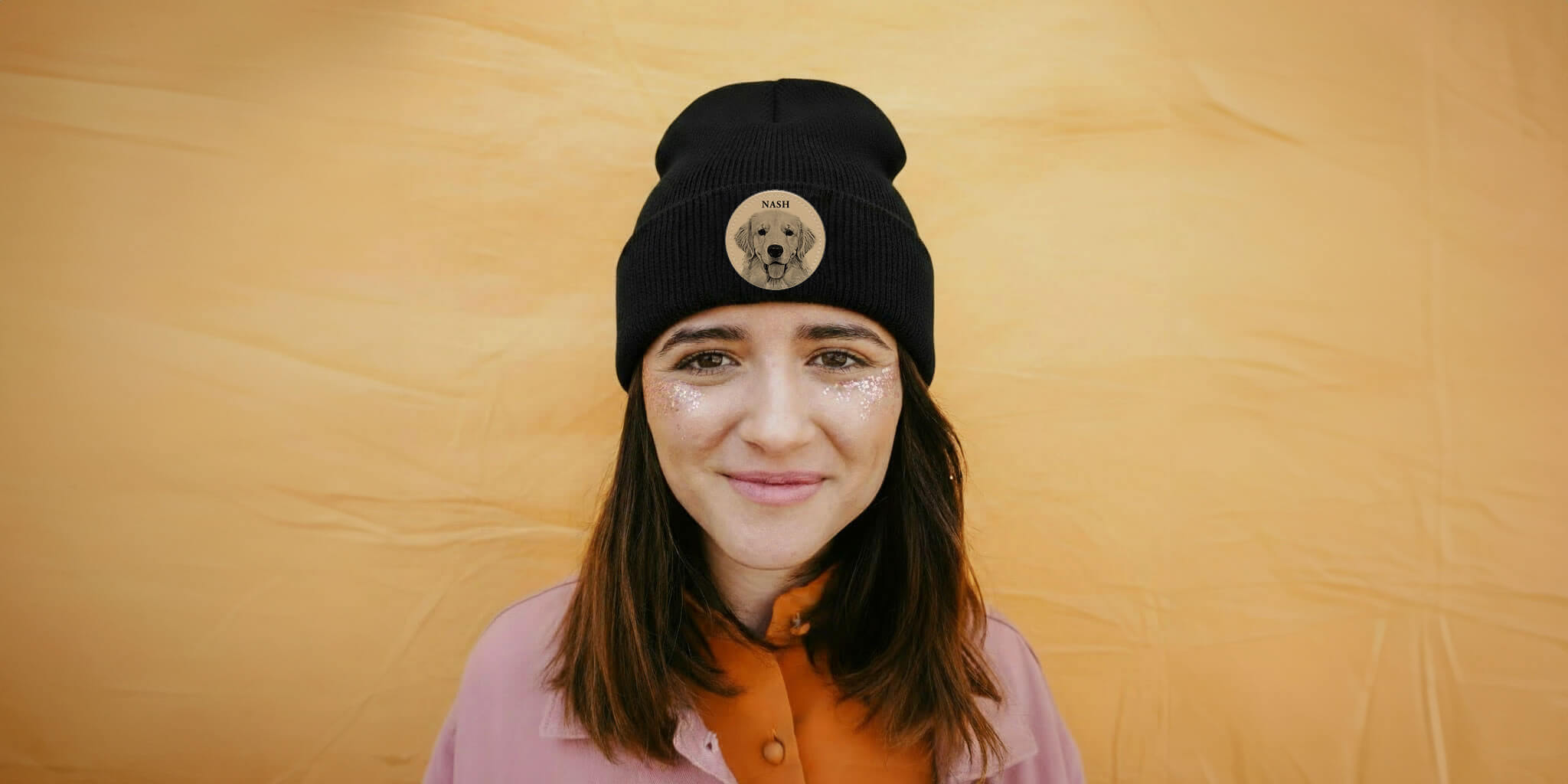 A women wearing a black Custom dog portrait beanie 