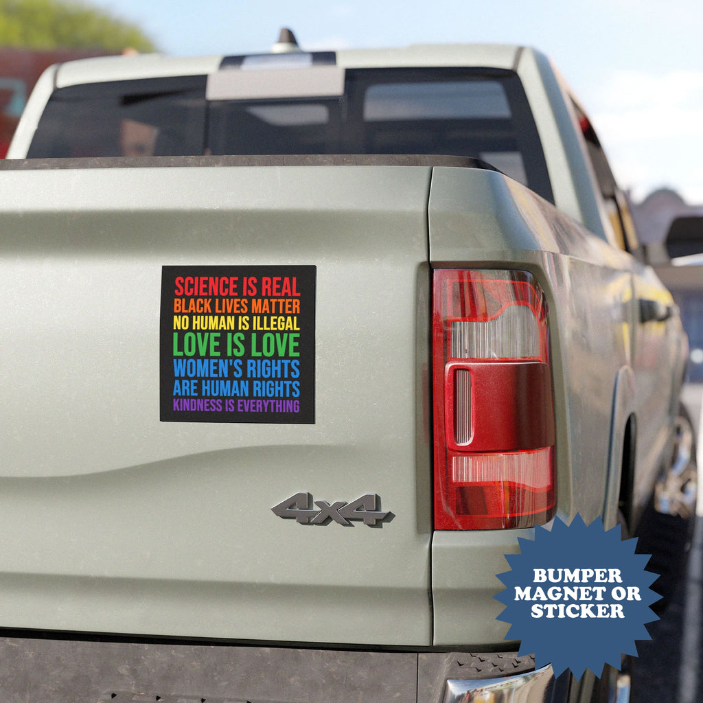Car with a bumper magnet or sticker on the back, featuring text about human rights and equality.